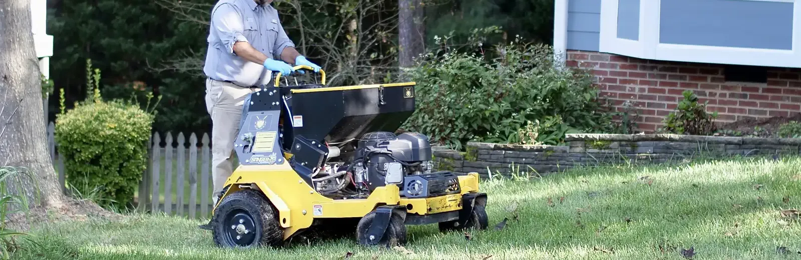 Tech riding stand-on lawn aerator equipment