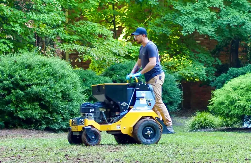 Lawn Technician riding ride-on lawn aeration machine 